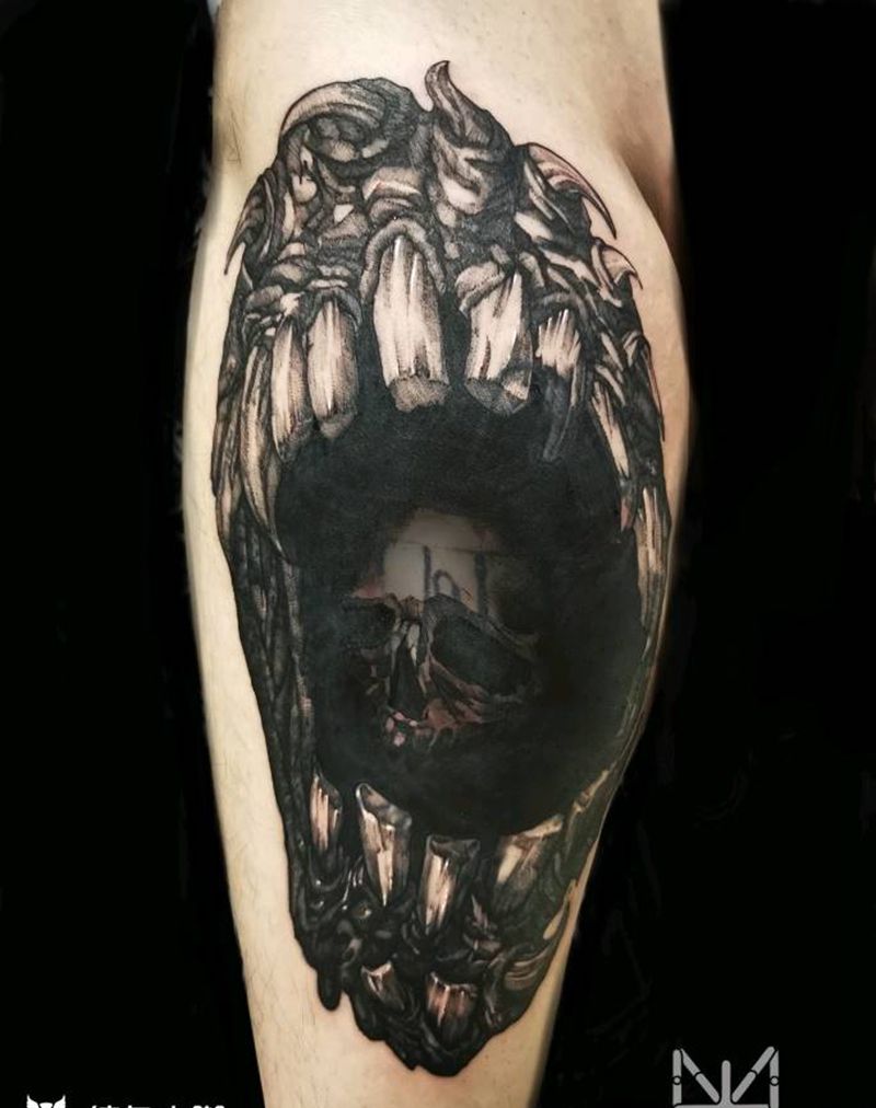 吞噬纹身图片_腿部欧美写实纹身图案