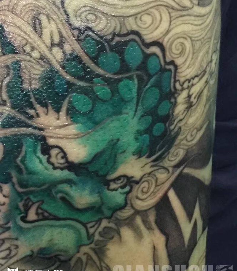 雷神局部纹身图片_手臂新传统纹身图案