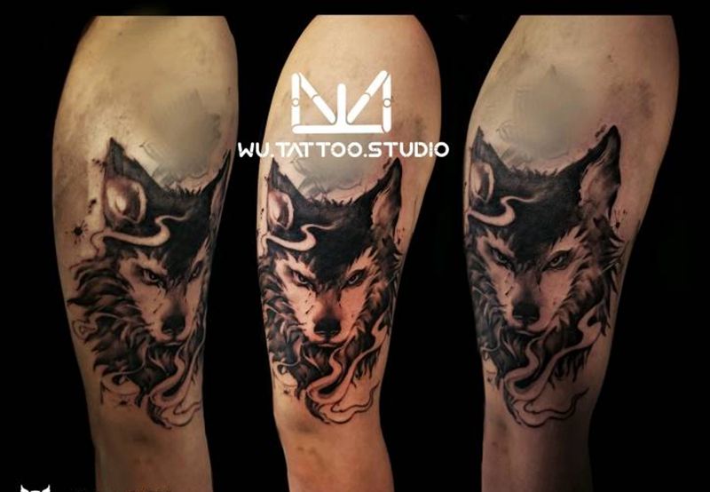 水墨狼纹身图片_手臂水墨纹身图案