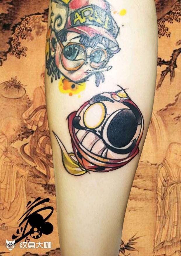 原创达摩纹身图片_腿部New School铃铛达摩达摩蛋纹身图案
