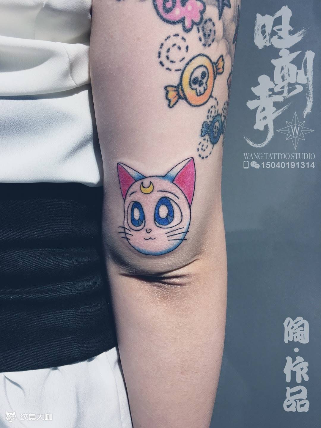 《水冰月》猫纹身图片_成品手臂清新动物纹身图案