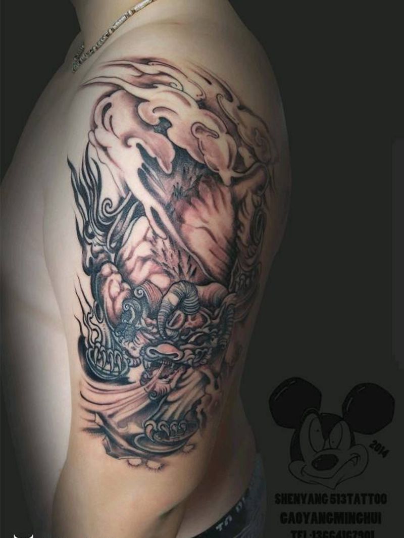 大臂麒麟纹身图片_手臂传统鬼神成品纹身图案