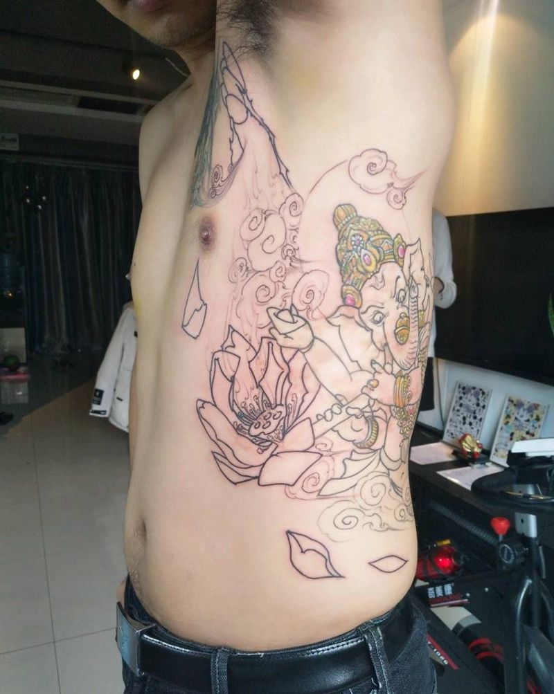 胎记遮盖纹身图片_腰部传统植物静物宗教原创成品纹身图案