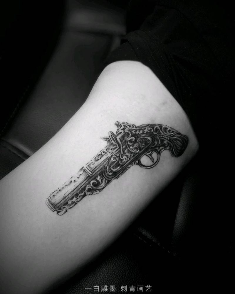 枪纹身图片_手臂欧美静物成品纹身图案