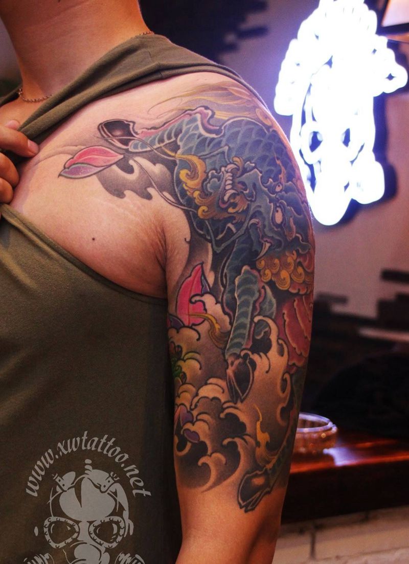 麒麟纹身图片_小伟刺青鬼神传统手臂成品纹身图案