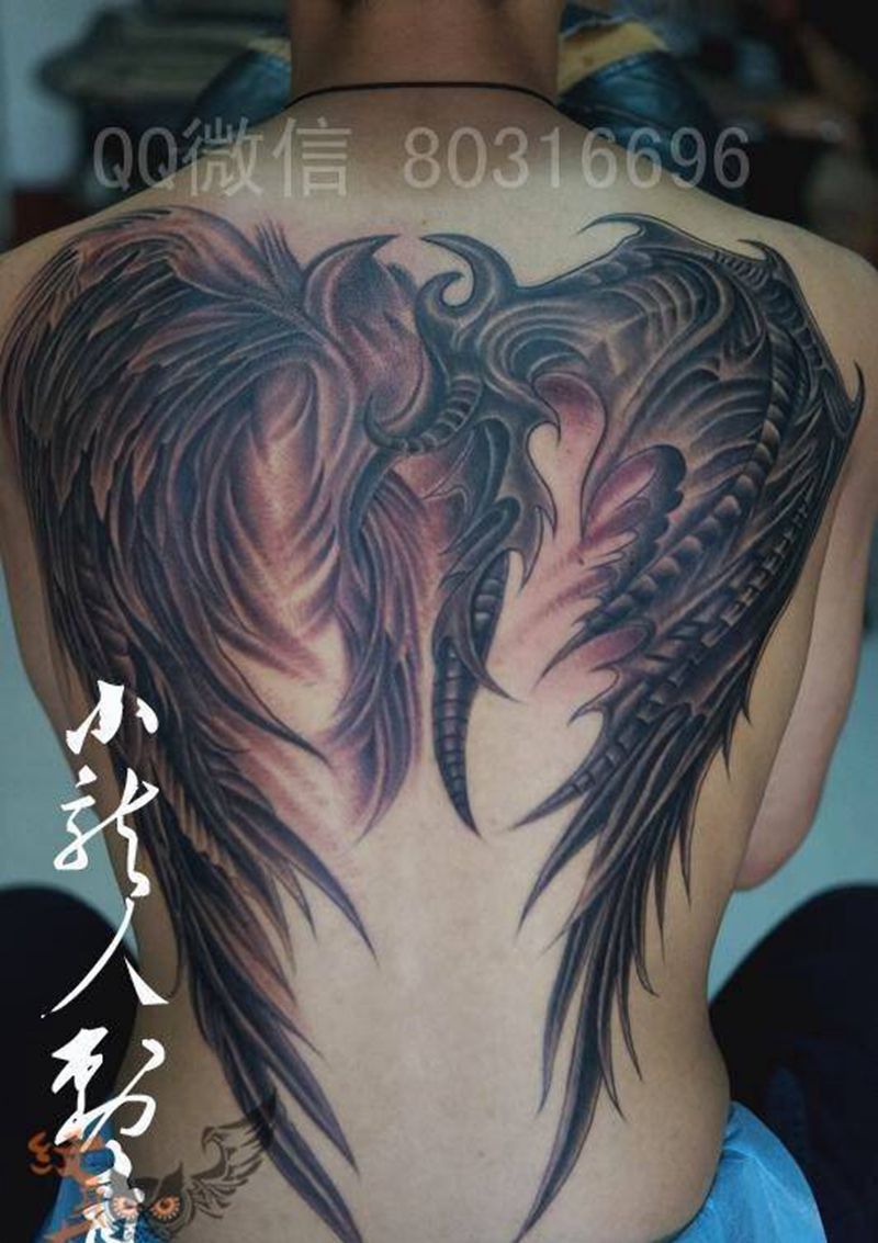 臂膀纹身图片_成品背部传统宗教纹身图案