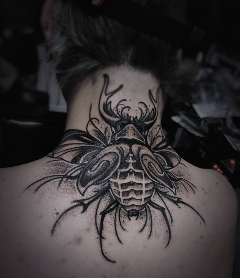 甲壳虫纹身图片_颈部点刺新传统纹身图案