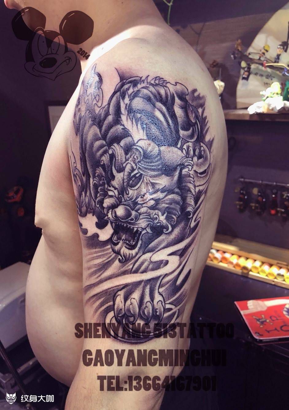 麒麟纹身图片_手臂新传统麒麟大臂新传统纹身图案