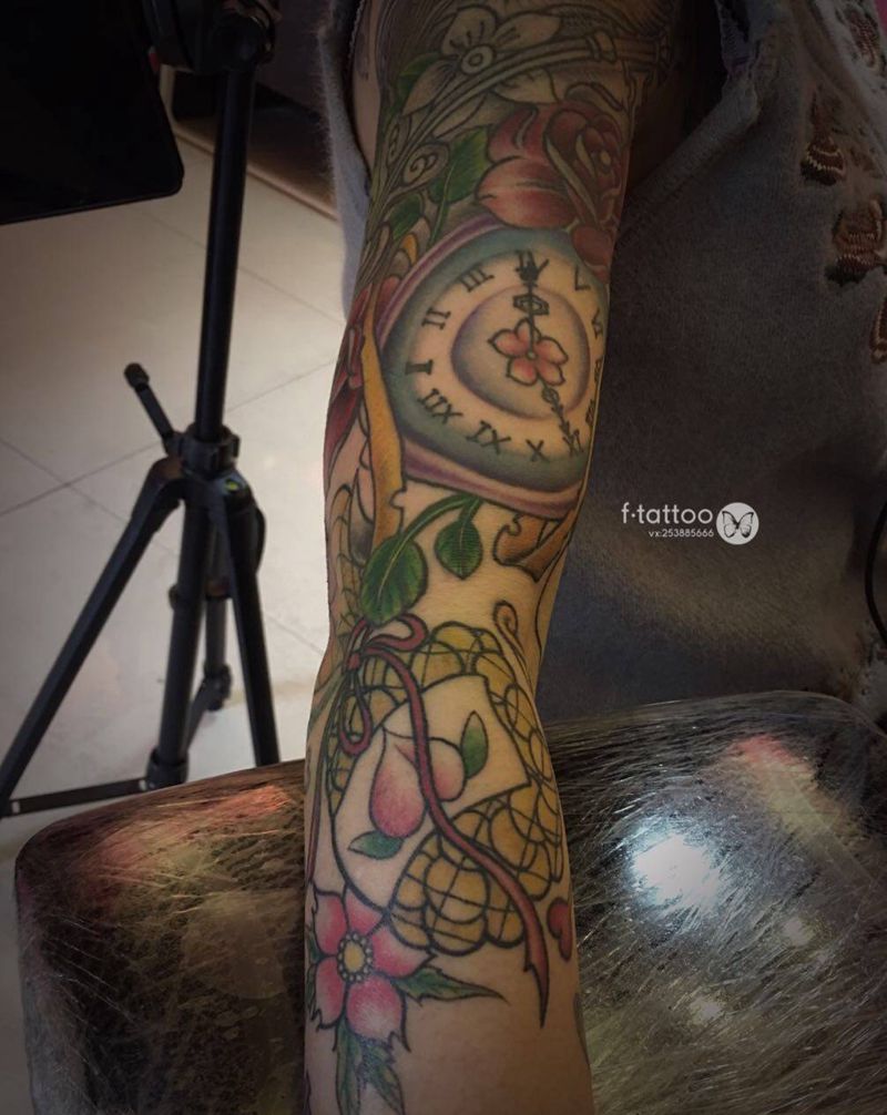 叮当猫百宝袋.纹身图片_手臂卡通彩色花臂纹身图案