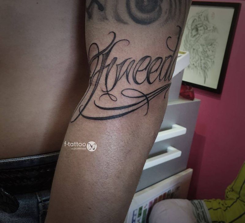 奇卡诺.纹身图片_手臂花体字英文纹身图案