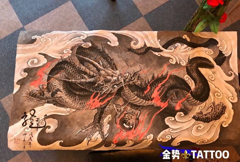 龙行天下纹身图片