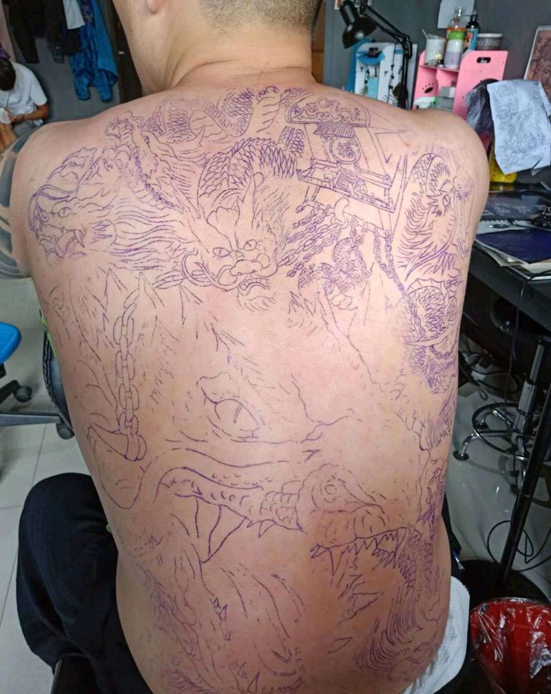 九龙拉棺纹身图片