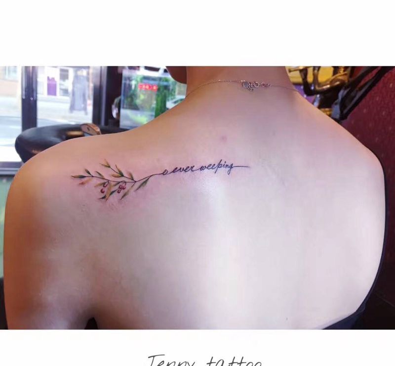 花➕字母纹身图片