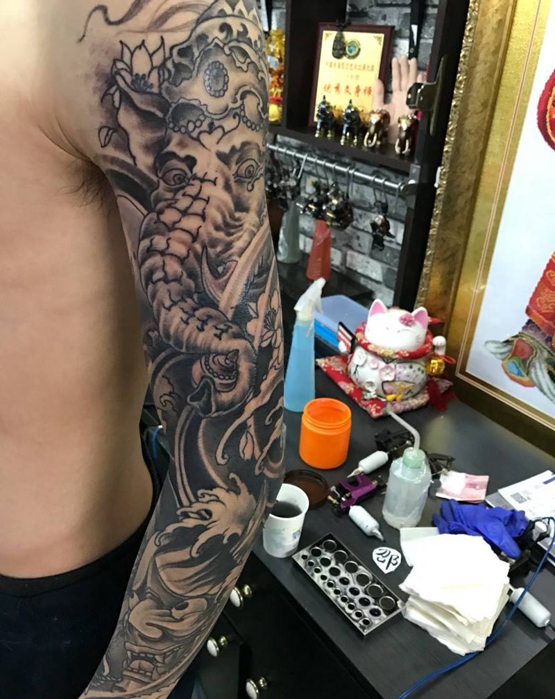 像神花臂纹身图片