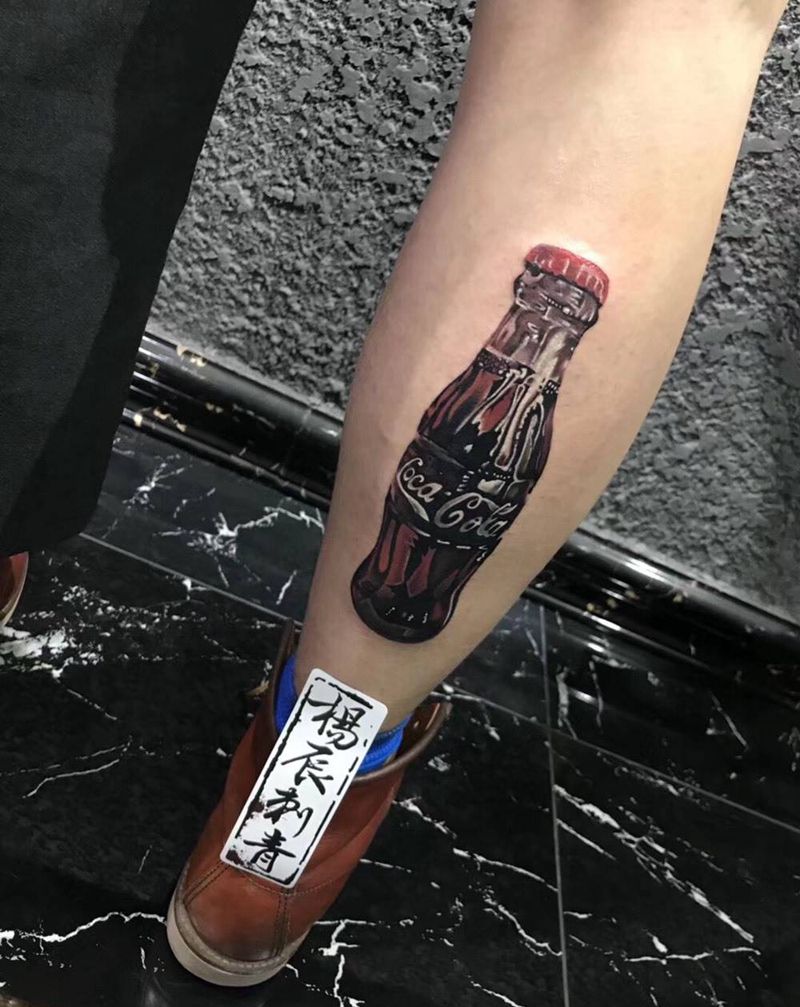 可口可乐纹身图片_腿部欧美写实纹身图案
