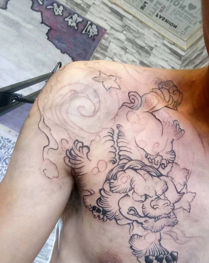 招福唐狮纹身图片_胸部传统习俗动物鬼神成品纹身图案