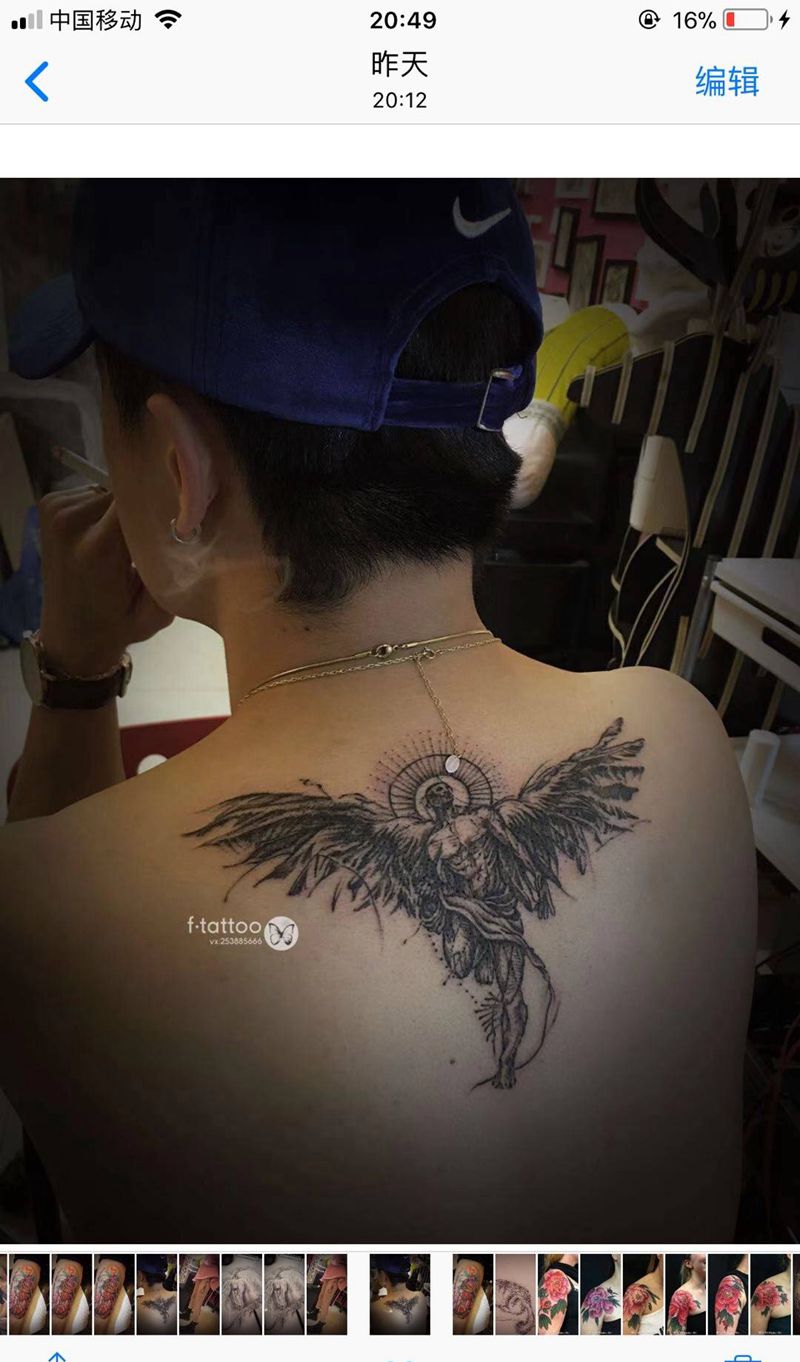 守护天使纹身图片_背部欧美写实黑灰守护天使纹身图案