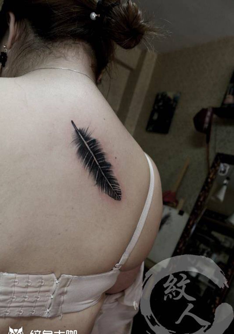 羽毛遮盖纹身图片