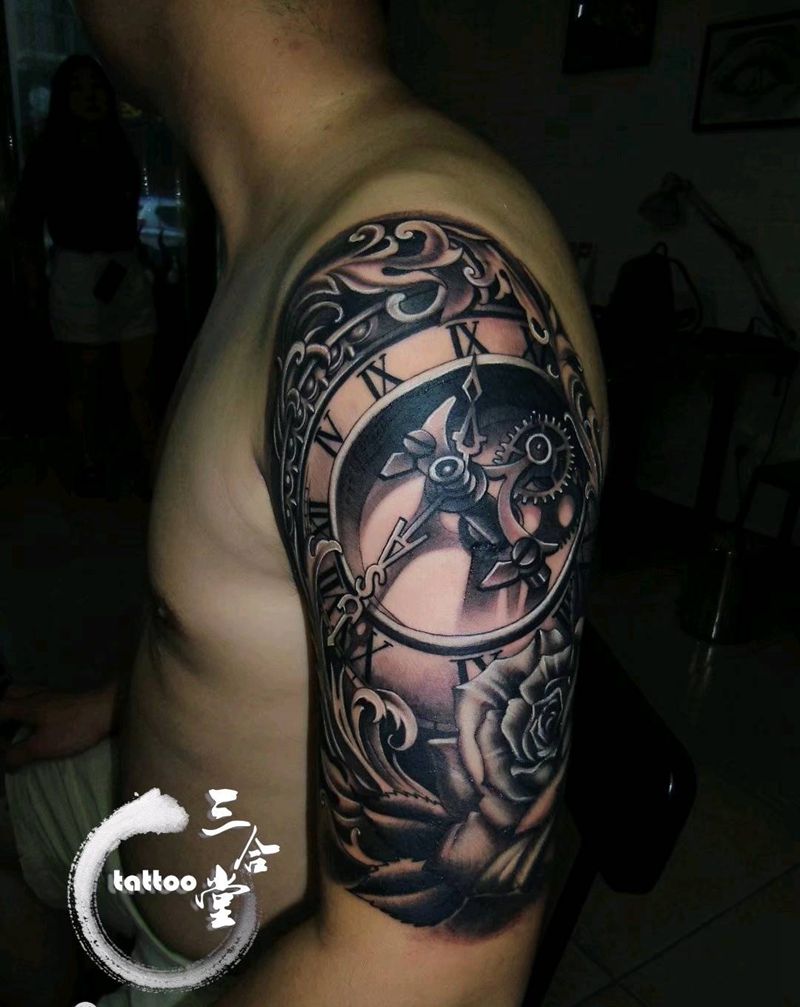 钟表纹身图片_手臂欧美写实纹身图案