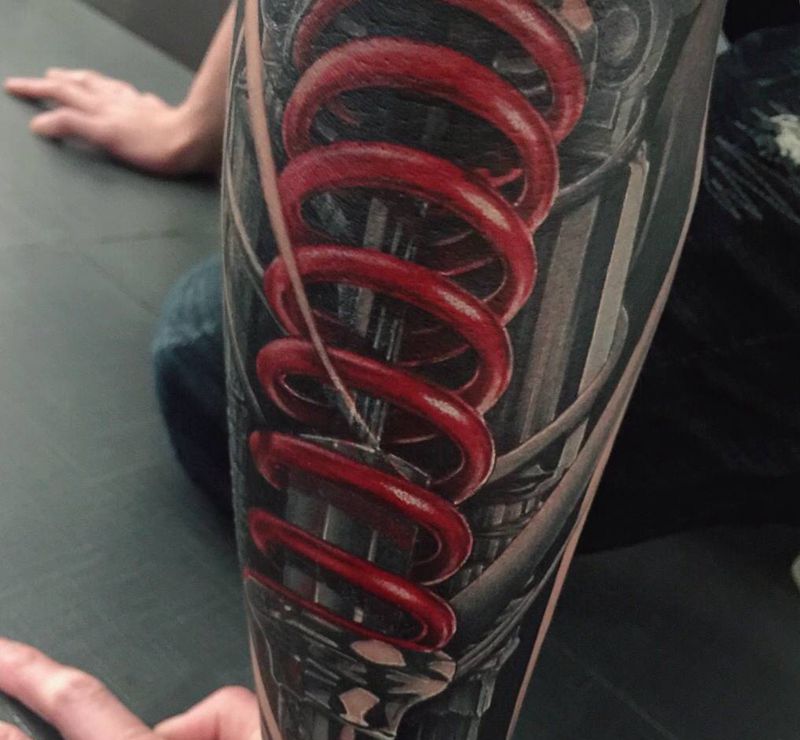 避震器纹身图片_手臂欧美写实纹身图案