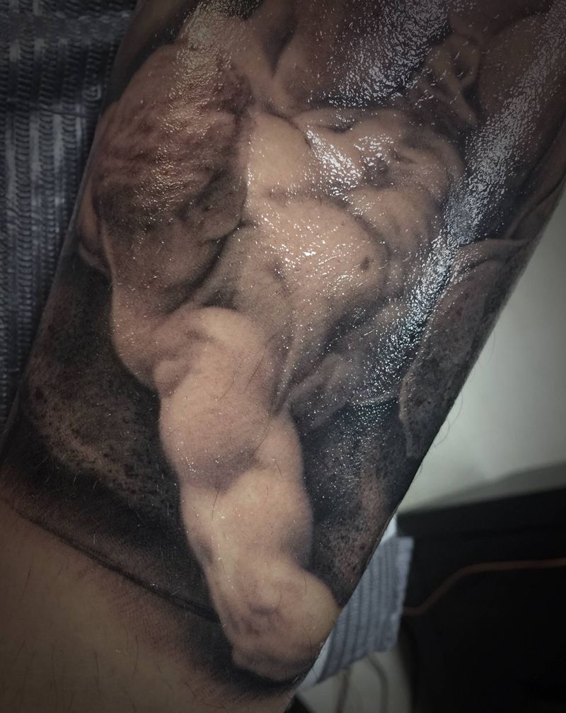 维也纳石雕纹身图片_手臂纹身图案