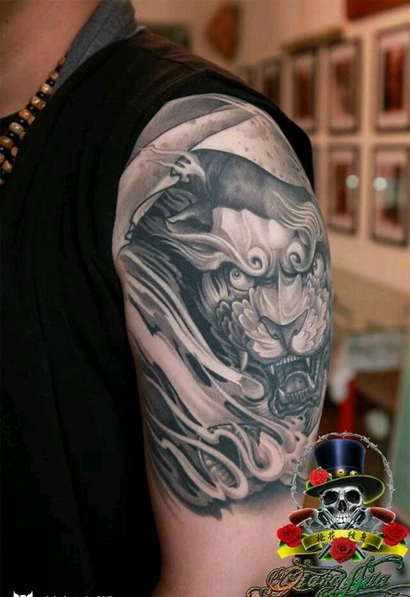 唐狮子纹身图片_手臂传统动物成品纹身图案