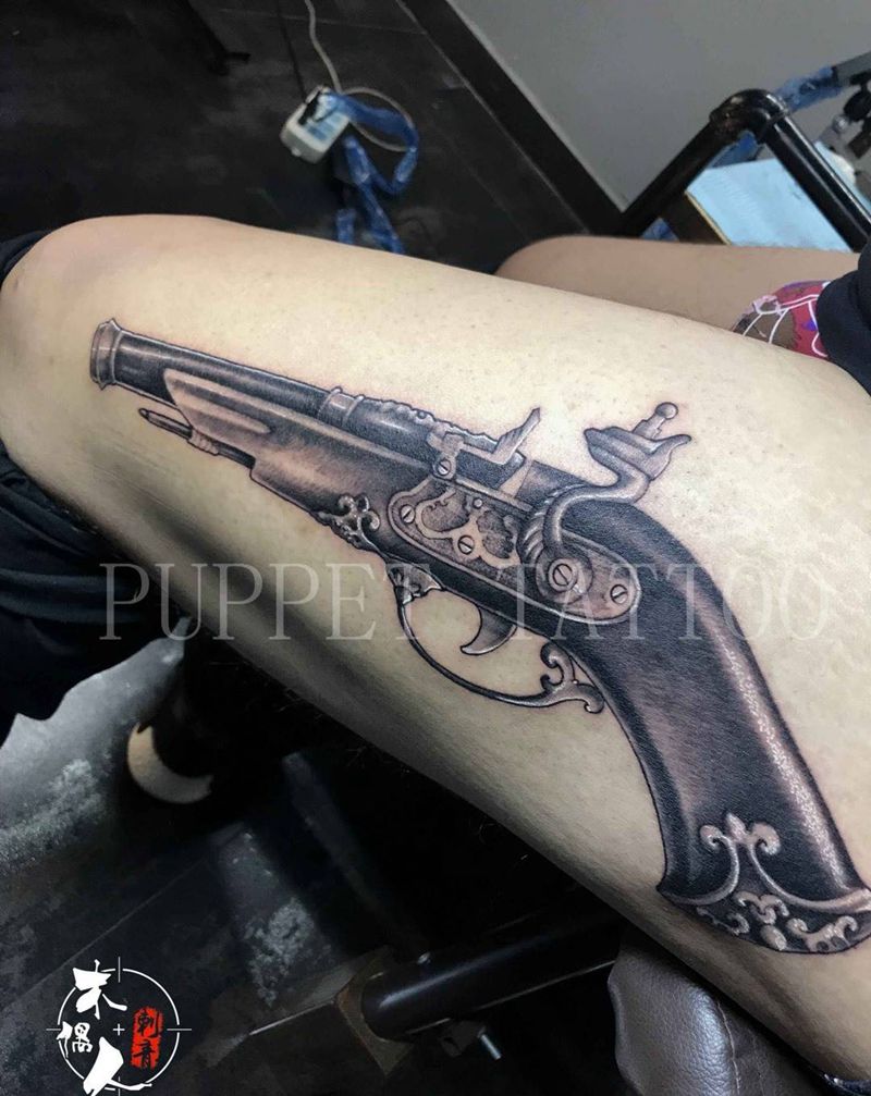 洋枪纹身图片