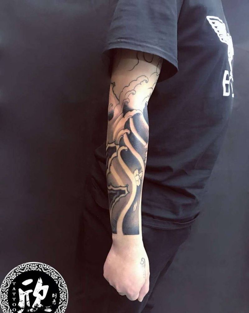 浪花臂纹身图片