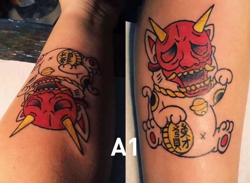 鬼面招财猫纹身图片_手臂Old SchoolNew School纹身图案