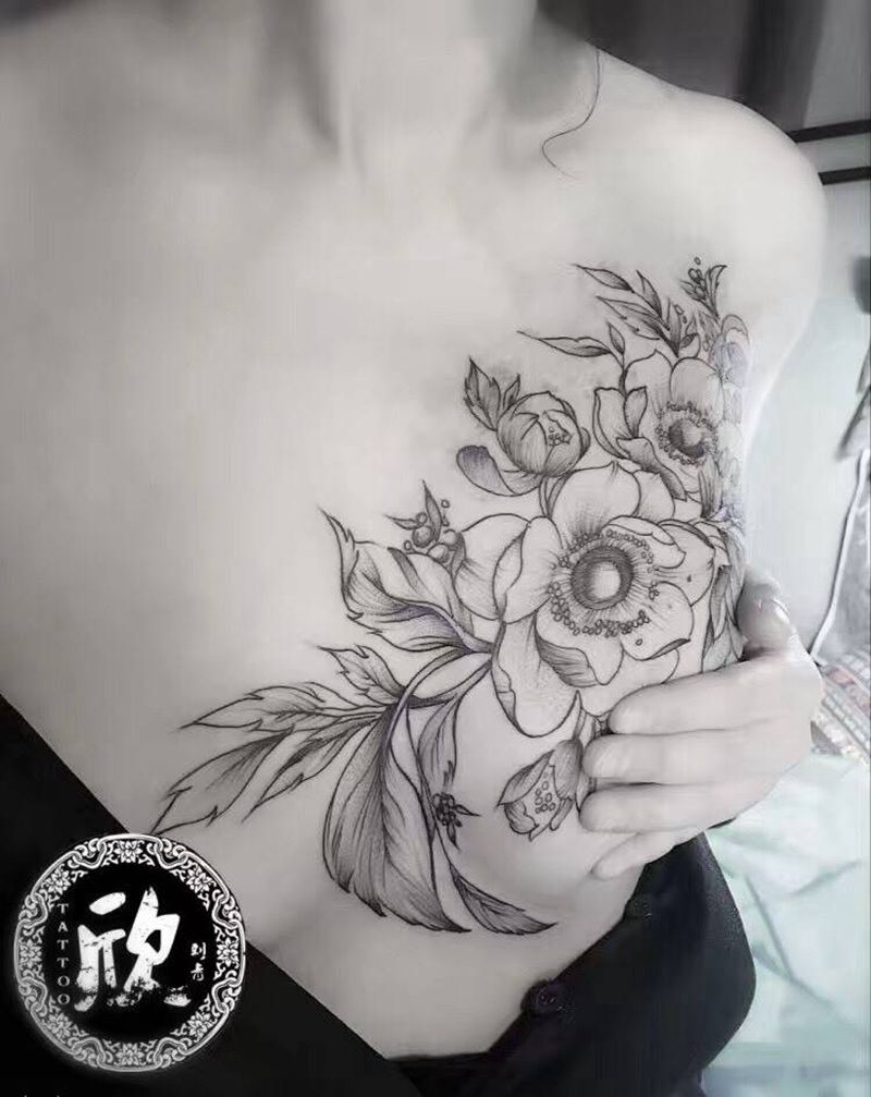 花纹身图片_胸部纹身图案