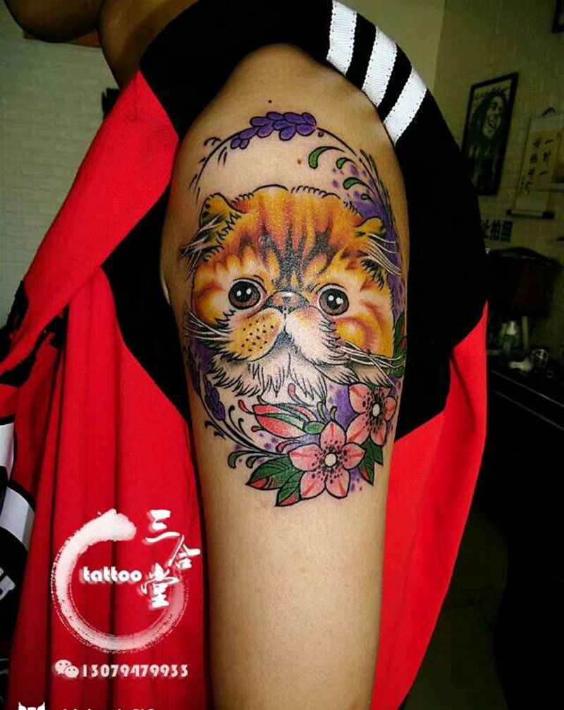 加菲猫纹身图片_肩部欧美清新动物原创营口鲅鱼圈纹成品纹身图案