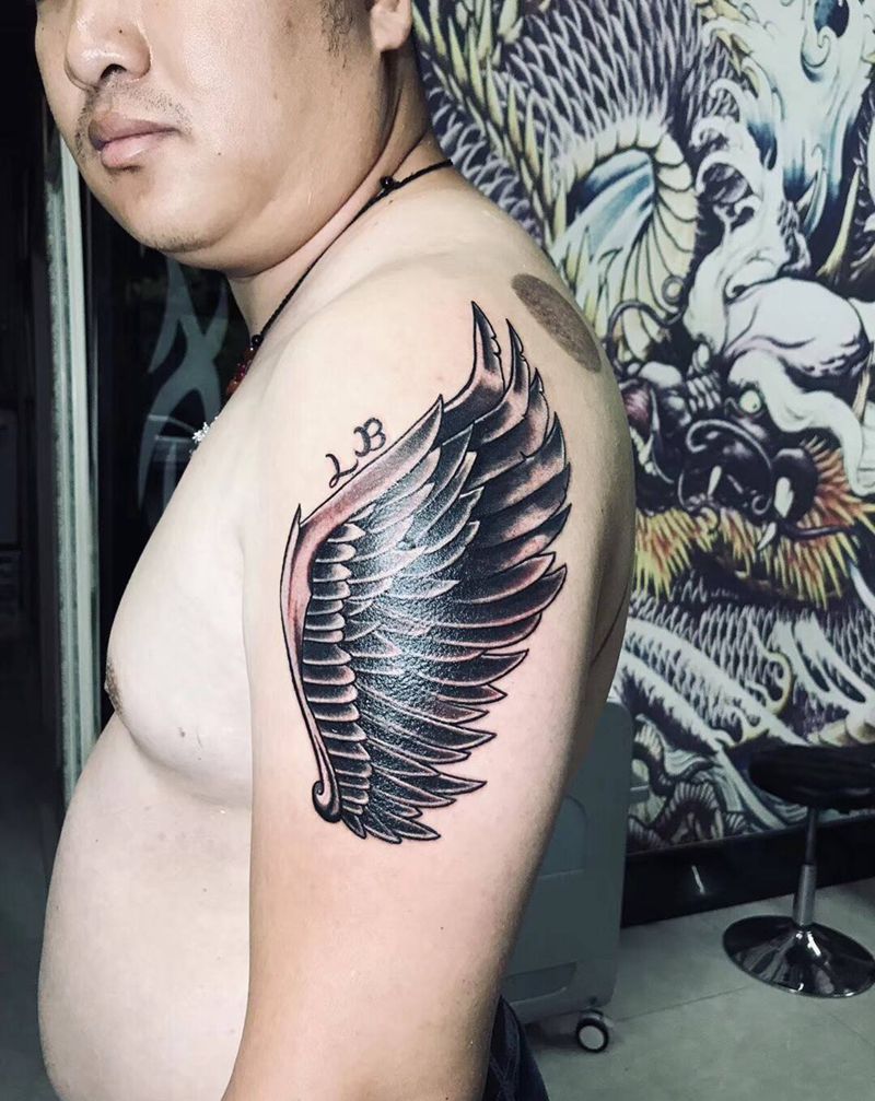翅膀纹身图片_手臂纹身图案