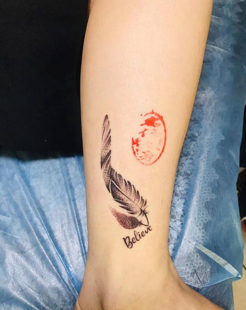 羽毛纹身图片_腿部纹身图案