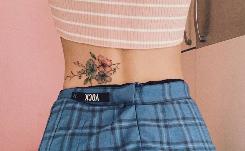 遮盖纹身图片_腰部纹身图案