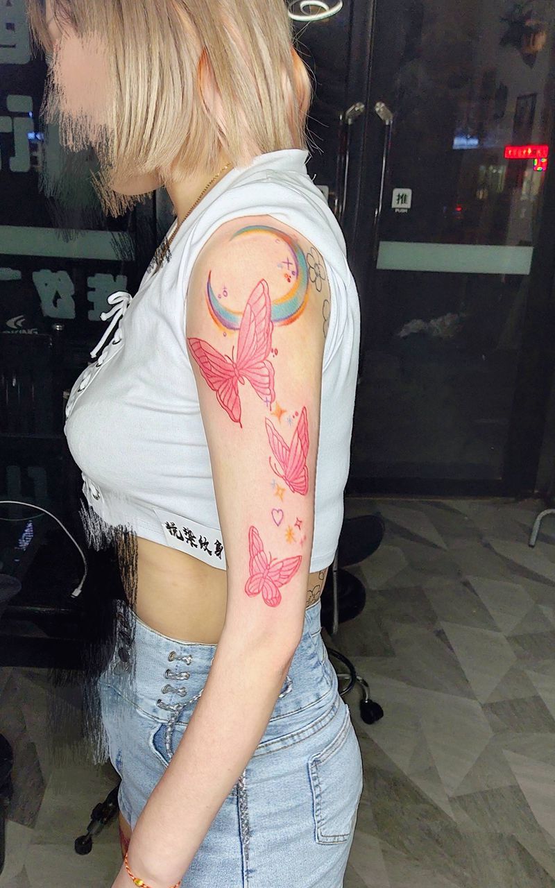 蝴蝶纹身图片_手臂水彩蝴蝶女师鲅鱼圈纹身图案