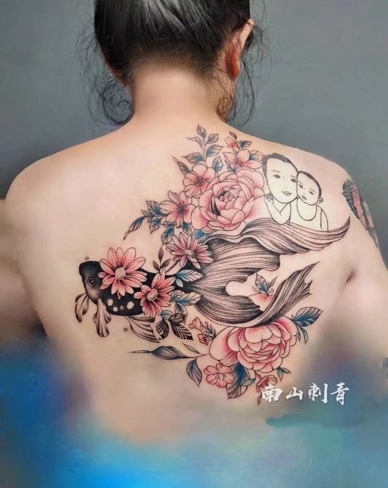 鱼纹身图片_背部腹部点刺几何纹身图案