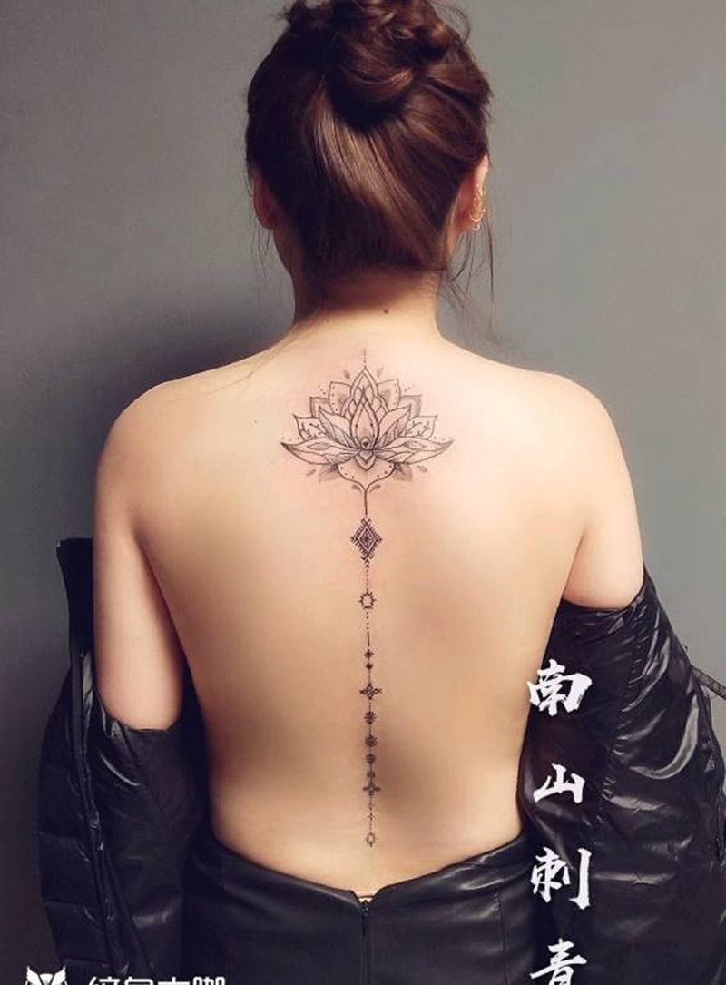 樊花纹身图片_背部腰部点刺图腾樊花纹身图案