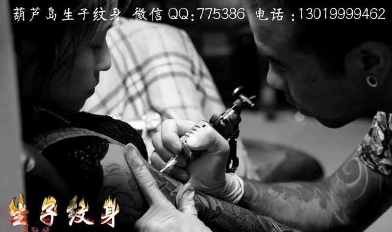 花臂纹身图片_成品臀部传统植物动物纹身图案