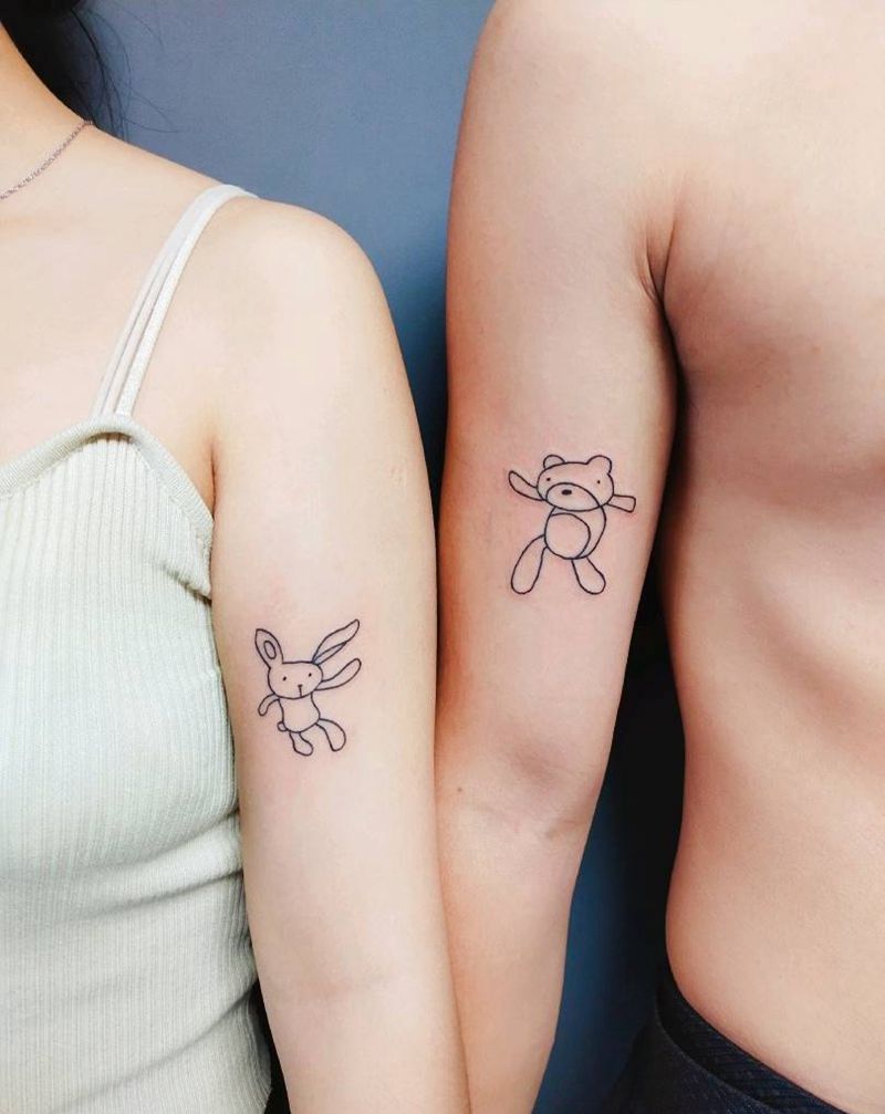 情侣款纹身图片_手臂几何图腾纹身图案