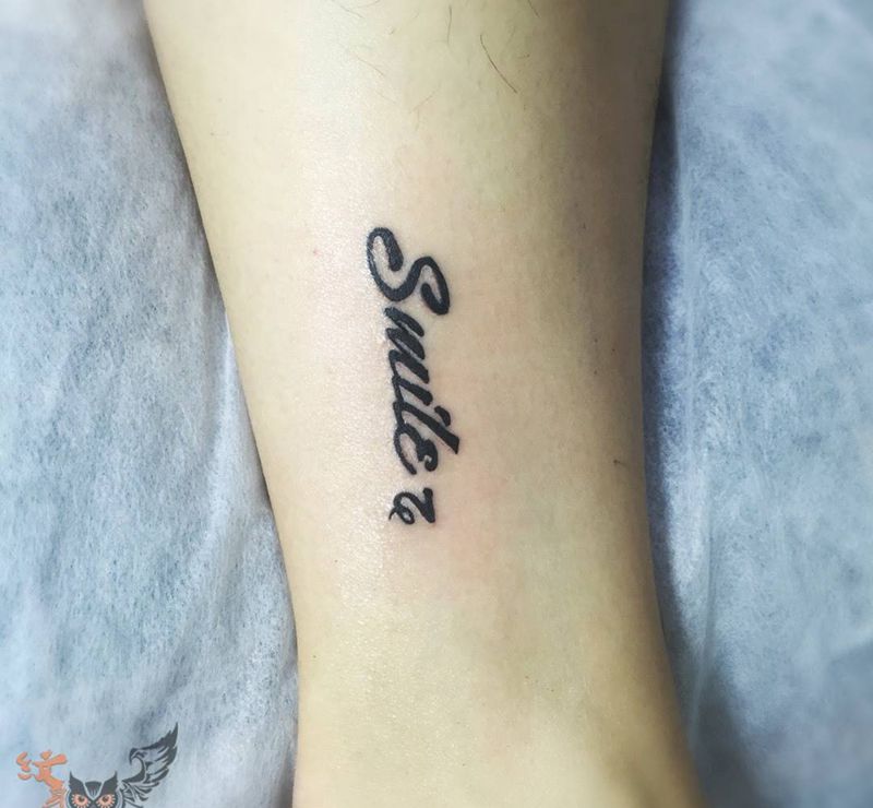 微笑纹身图片_成品纹身图案