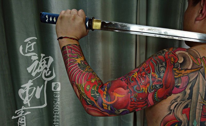 雷神花臂纹身图片_手臂新传统纹身图案