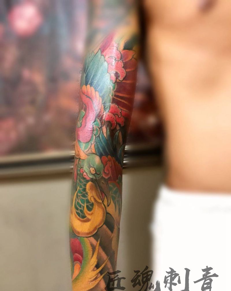 接花臂凤凰，纹身图片_成品手臂传统纹身图案