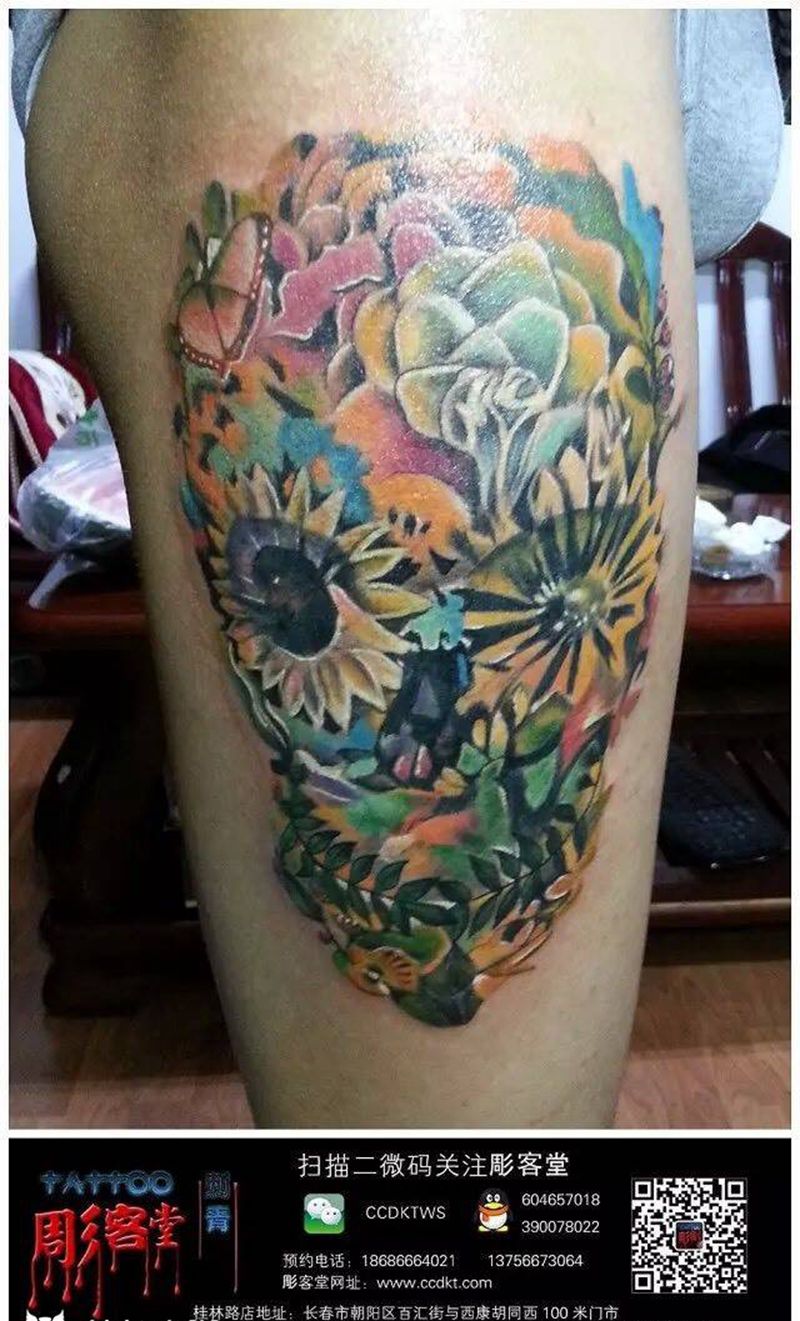 花中骷髅纹身图片_成品腿部植物鬼神纹身图案