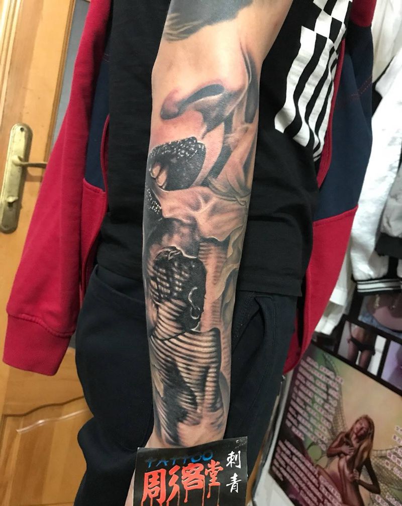 欧美花臂进行中纹身图片_手臂欧美人物纹身图案