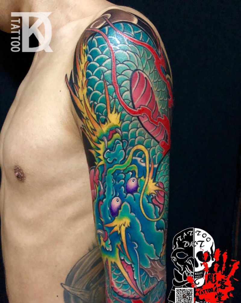 花臂龙纹身图片_手臂新传统纹身图案