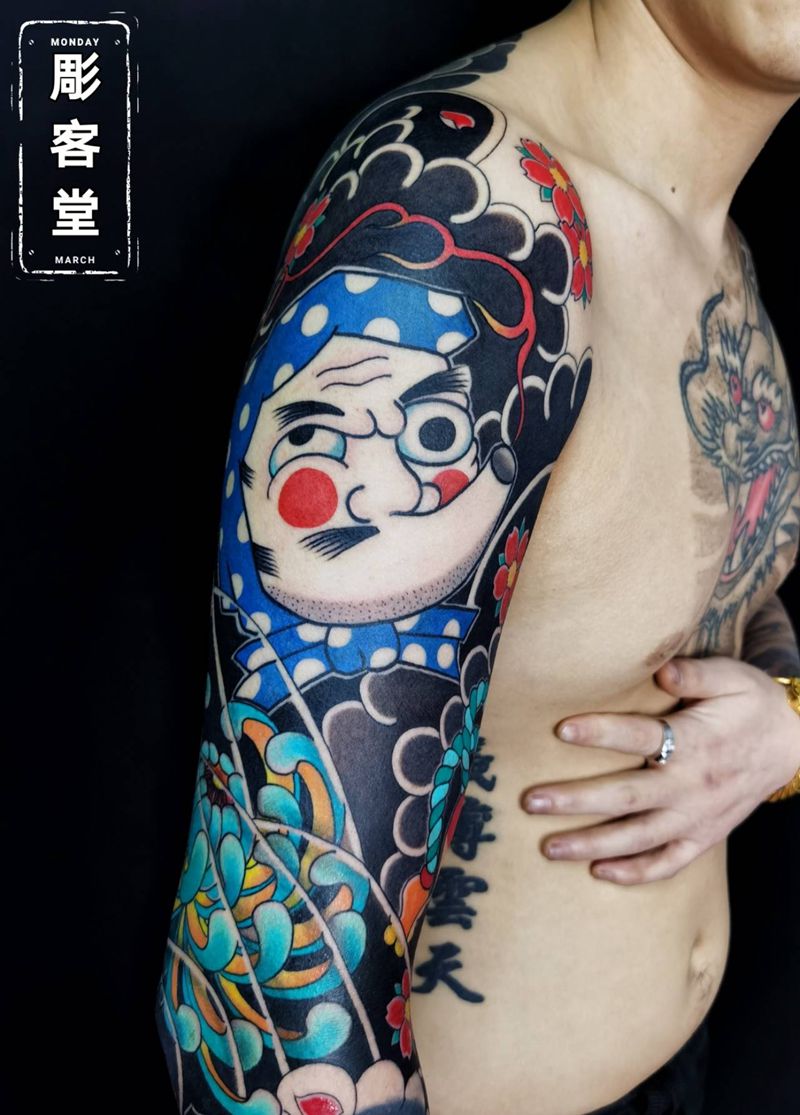 修改添加花臂火男能面纹身图片_手臂老传统纹身图案