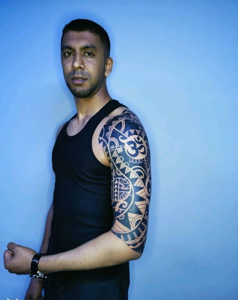 外国友人大臂玛雅图腾纹身图片_手臂图腾纹身图案