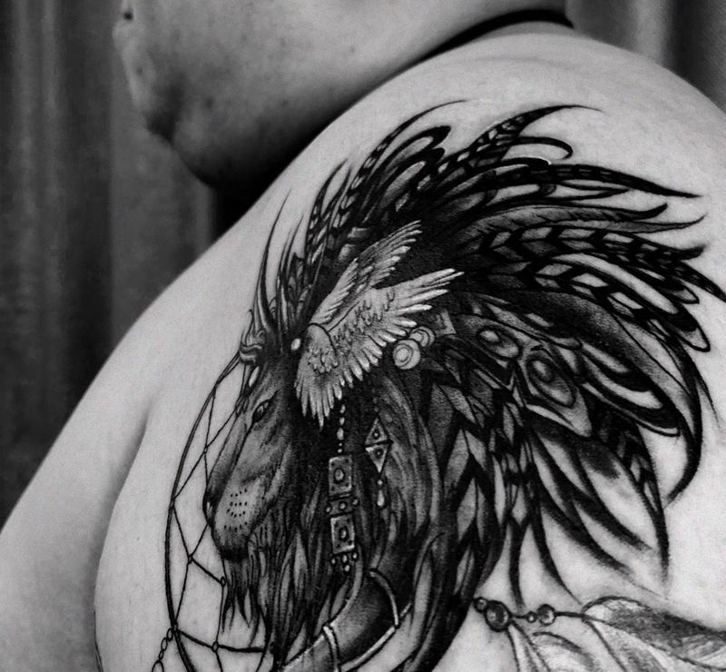 狮子捕梦网纹身图片