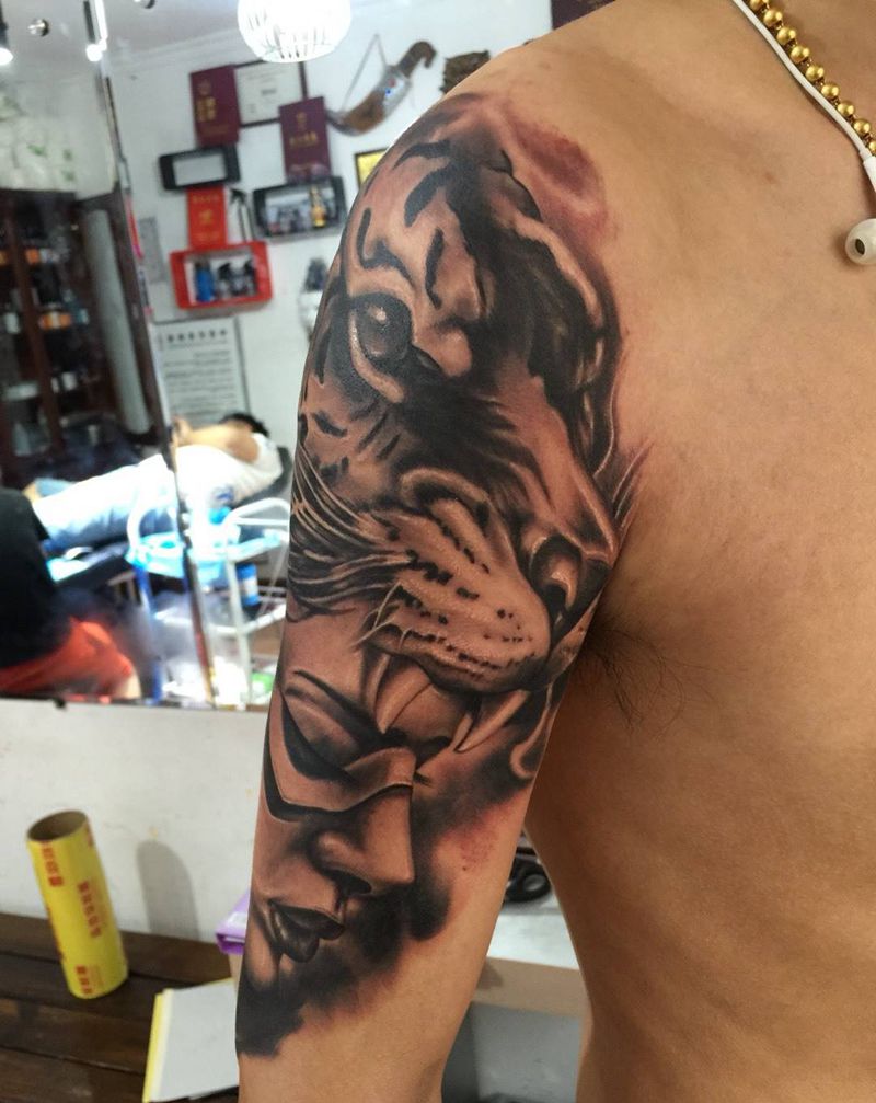 披着虎皮的女人  未完成待续纹身图片_手臂写实欧美人物纹身图案