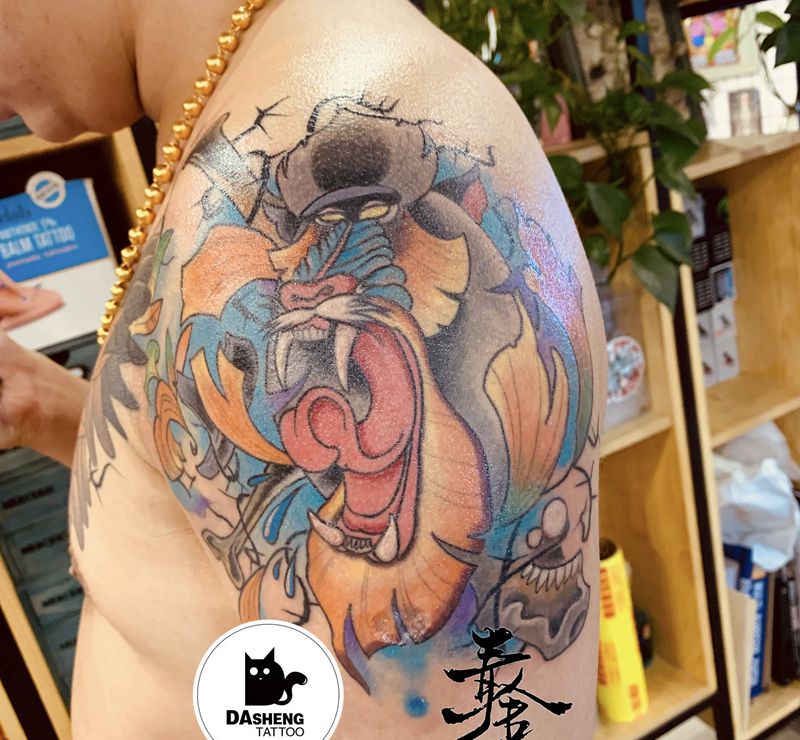 吃肉的大狒狒纹身图片_手臂New School狒狒纹身图案